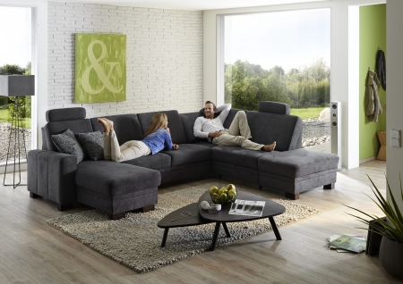 Sedací souprava CINCINATTI_ sestava CanL-2,5EL-SE-1,5AhoR_ rohové rozměry zleva 163 x 319 x 241 cm_ volitelné funkce a polštáře za příplatek_ v látce Miro grau_ foto s modelem_ obr. 8