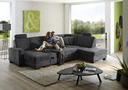 Sedací souprava CINCINATTI_ sestava CanL-2,5EL-SE-1,5AhoR_ rohové rozměry zleva 163 x 319 x 241 cm_ volitelné funkce a polštáře za příplatek_ v látce Miro grau_ foto s modelem_ obr. 12
