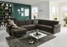 Sedací souprava GRANADA_ sestava CanGL-2,5EL-RE-2,5R_ rohové rozměry zleva 180 x 338 x 270 cm_ výška 83-106 cm_ volitelné funkce za příplatek_ v látce Belle anthrazit_ foto s modelem_ obr. 3 Sedací souprava GRANADA_ sestava CanGL-2,5EL-RE-2,5R_ rohové rozměry zleva 180 x 338 x 270 cm_ výška 83-106 cm_ volitelné funkce za příplatek_ v látce Belle anthrazit_ foto s modelem_ obr. 3