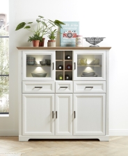 Nábytek do obývacího pokoje a jídelny JASPER_ highboard 10 G9 UH 22_ rozměry š/v/h_ 143/150/42 cm_ čelní pohled_ včetně LED osvětlení_ foto s dekorací_ obr. 8